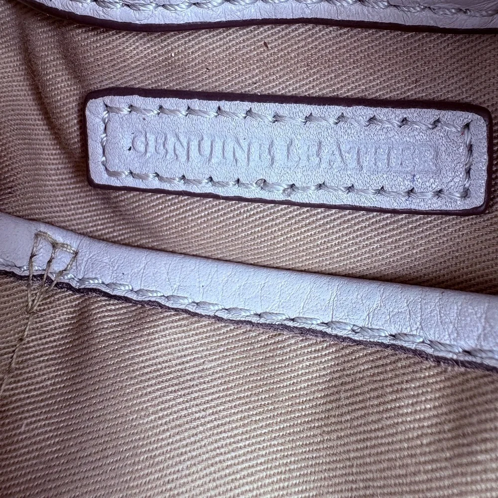 G.I.L.I. Got It. Love It. White Pebbled Leather Drawstring Hobo Tassel